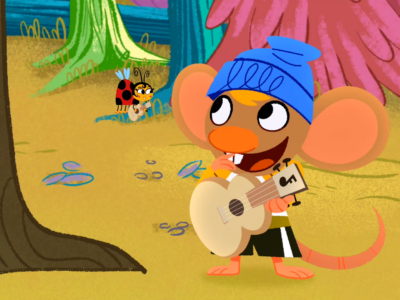 Stu looks at a flower